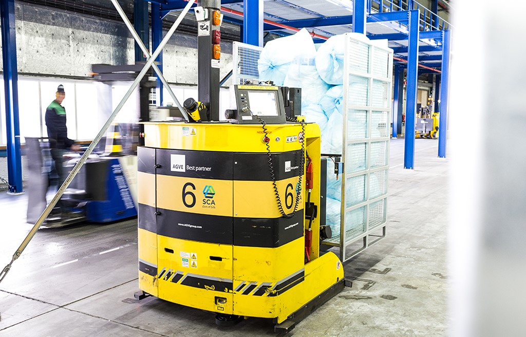 Automated guided vehicle in warehouse or factory environment